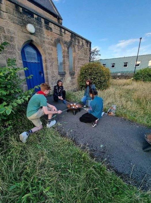 Neighbours enjoying the outdoor space beside St Paul’s Centre